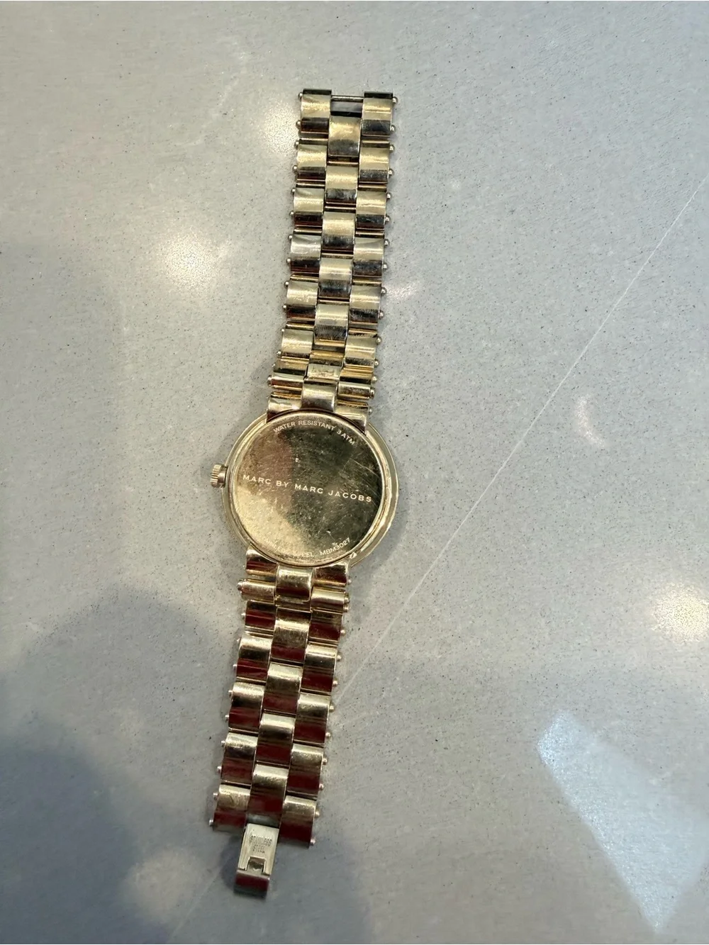 Marc Jacobs gold tone